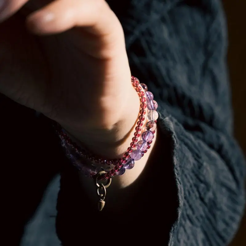 Handcrafted Natural Garnet Bracelet | Zodiac Horse Wealth Amulet 1 - Buddha Bodhis Wearing Garnet Bracelet on Left Hand