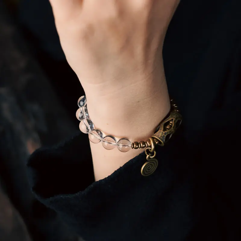 Raw Clear Quartz Bracelet | Clarity & Grounding Jewelry 1 - Buddha Bodhis Wearing Clear Quartz Bracelet on Right Hand