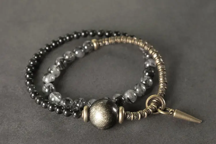 How Much Does Real Black Obsidian Cost? An Expert's Guide to Its Value 1 - Buddha Bodhis Golden Sheen Obsidian & Black Rutilated Quartz