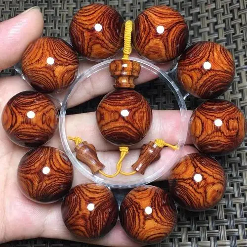 - Buddha Bodhis Authentic Huanghua Pear Wood Beads with Ghost Face