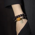 Dzi Bead Ebony Bracelet | Yellow Jade Prosperity Amulet 1 - Buddha Bodhis Dzi Bead Ebony Bracelet Yellow Jade Prosperity Amulet