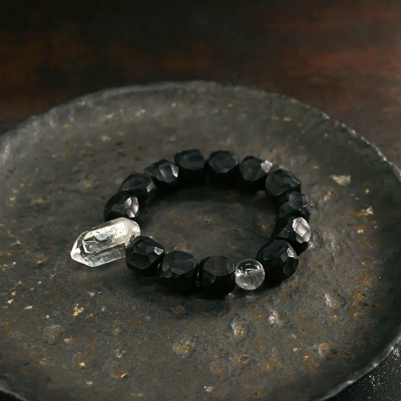The Alchemist's Jewel A Carved Ebony And Quartz Bracelet (1) The Alchemist's Jewel A Carved Ebony And Quartz Bracelet