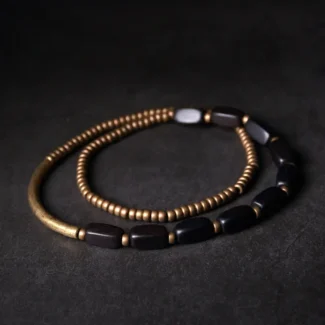 The Path & The Pillar An Ebony and Brass Bracelet Set