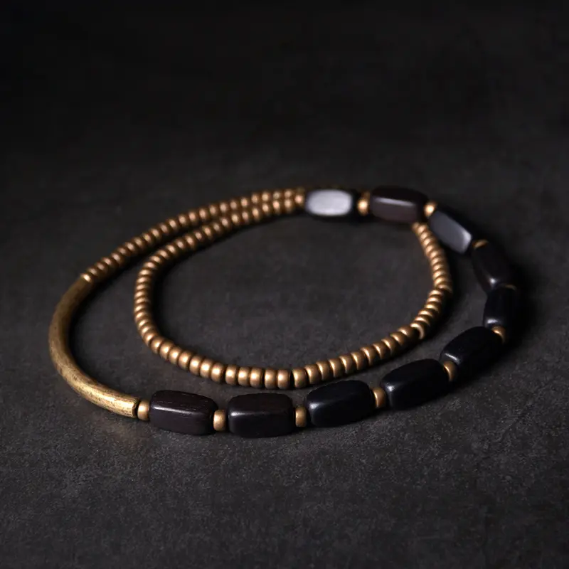 The Path & The Pillar An Ebony and Brass Bracelet Set (2) The Path & The Pillar An Ebony and Brass Bracelet Set