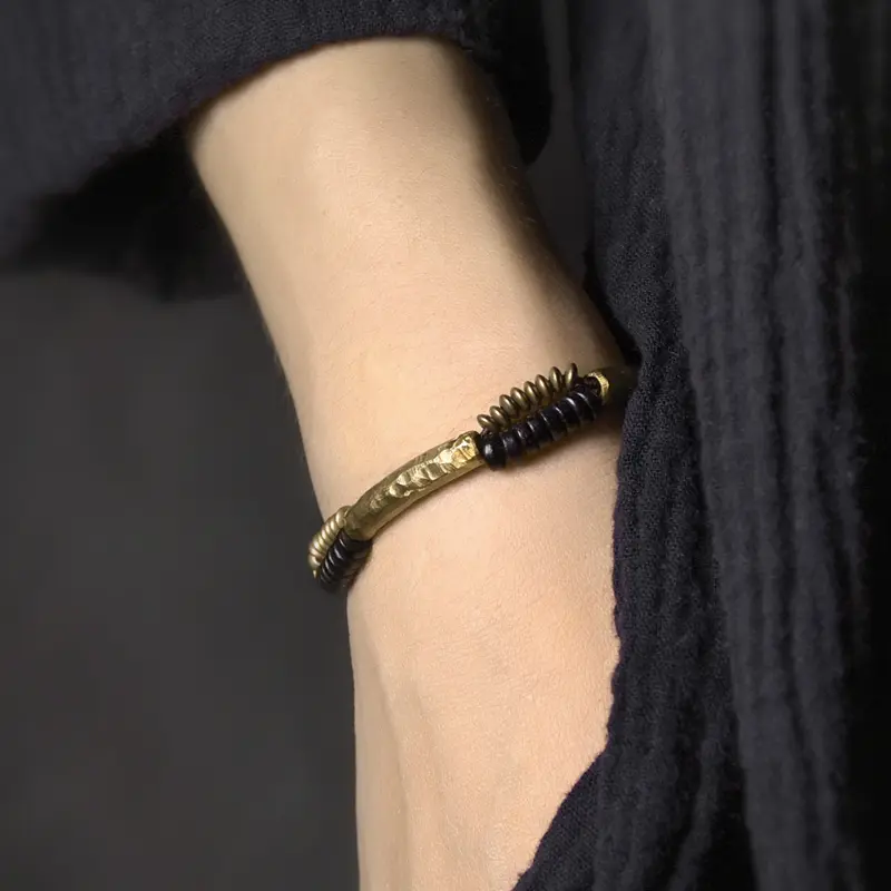 The Pillar of Stillness A Hammered Brass Ebony Bracelet (1) The Pillar of Stillness: A Hammered Brass Ebony Bracelet - Buddha Bodhis