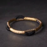 The Pillar of Stillness: A Hammered Brass Ebony Bracelet 1 - Buddha Bodhis The Pillar of Stillness A Hammered Brass Ebony Bracelet