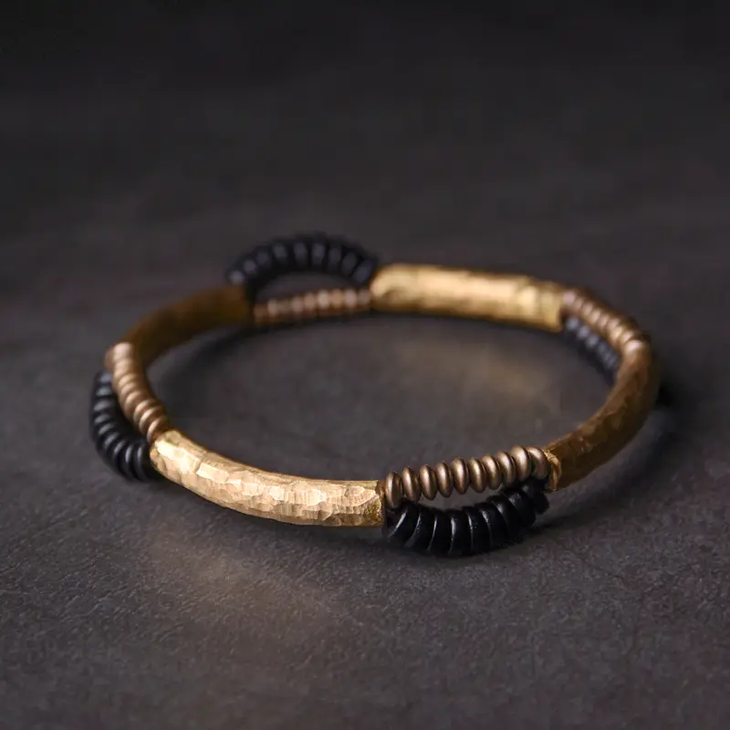 The Pillar of Stillness A Hammered Brass Ebony Bracelet (2) The Pillar of Stillness A Hammered Brass Ebony Bracelet