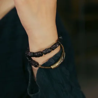 The River Stone Path A Carved Ebony Brass Bracelet