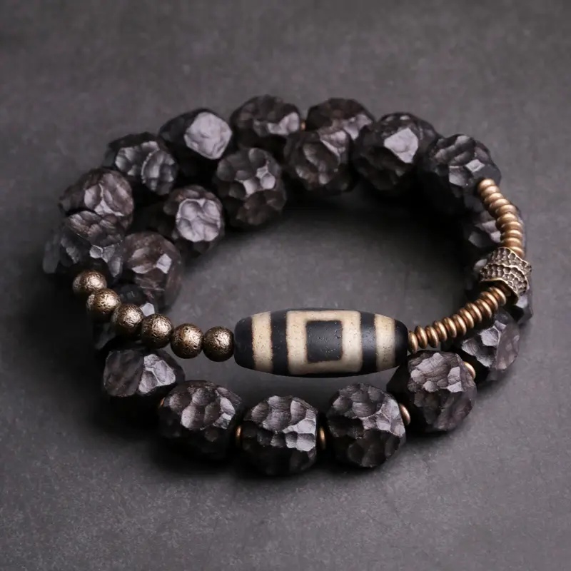 The Sacred Path A Carved Ebony Dzi Wrap Bracelet (2) The Sacred Path A Carved Ebony Dzi Wrap Bracelet