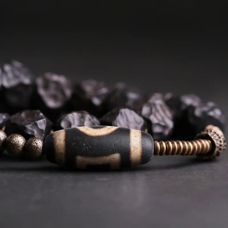 The Sacred Path A Carved Ebony Dzi Wrap Bracelet (4) The Sacred Path A Carved Ebony Dzi Wrap Bracelet