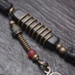 The Shaman's Charm: A Carved Ebony Agate Bracelet 2 - Buddha Bodhis The Shaman's Charm A Carved Ebony Agate Bracelet