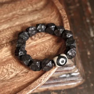 The Wabi Sabi Eye A Carved Ebony Dzi Bracelet