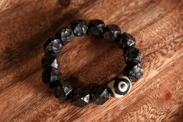 The Wabi Sabi Eye: A Carved Ebony Dzi Bracelet 5 - Buddha Bodhis The Wabi Sabi Eye A Carved Ebony Dzi Bracelet