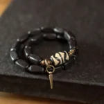 The Wave of Fortune: A Wave of Fortune Dzi Bracelet 2 - Buddha Bodhis The Wave of Fortune A Wave of Fortune Dzi Bracelet