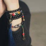 Tibetan Dzi Bead Mala | Ebony Wood Tassel Bracelet - Buddha Bodhis Tibetan Dzi Bead Mala Ebony Wood Tassel Bracelet