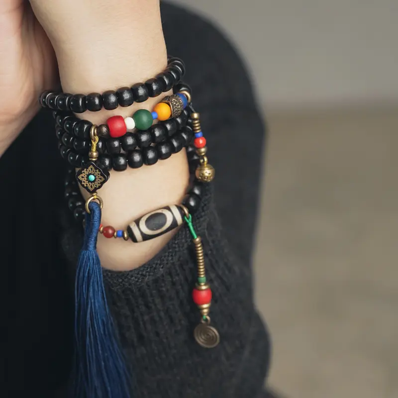 Golden Obsidian Ebony Bracelet | Grounded Vision Jewelry 1 - Buddha Bodhis Wearing Ebony Wood Bracelet on Left Hand