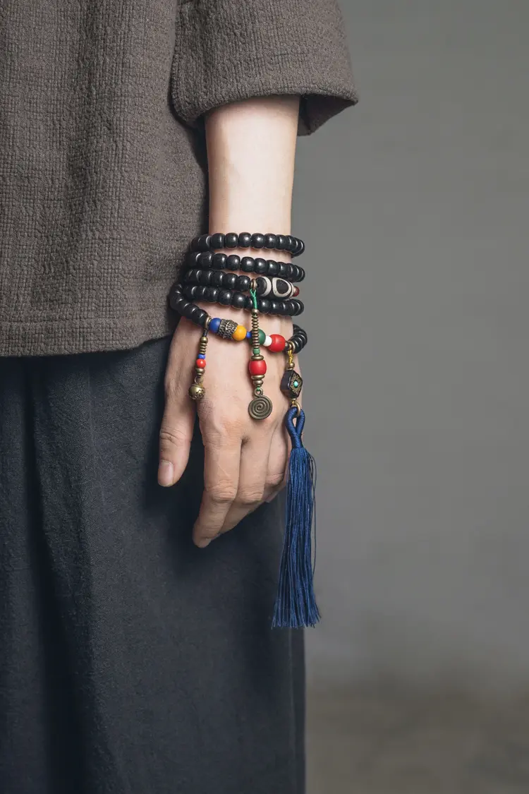 Tibetan Dzi Bead Mala | Ebony Wood Tassel Bracelet 1 - Buddha Bodhis How to hold Mala Beads for Japa Meditation