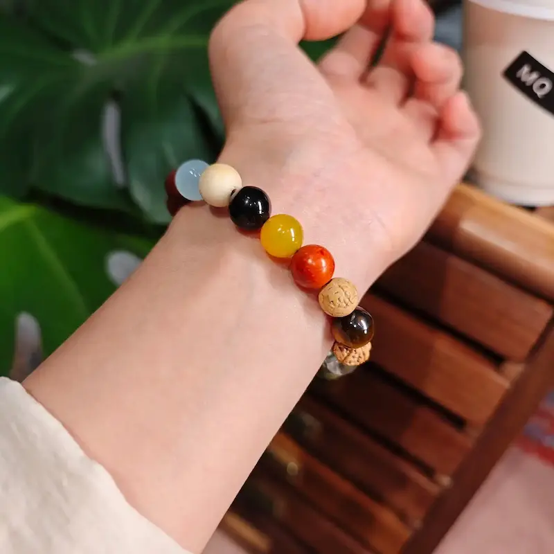 7 Chakra Multi-Color Agate Bracelet | Emotional Balance & Harmony 1 - Buddha Bodhis Wearing 7 Chakra Mala on Left Hand