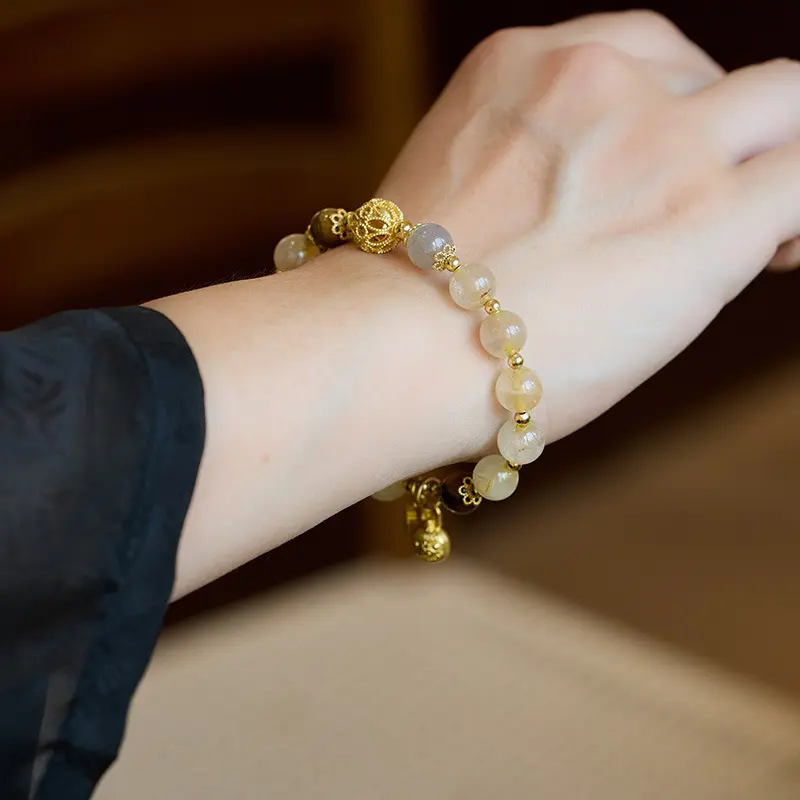 1 - Buddha Bodhis Wearing Gold Rutilated Quartz Bracelet on Left Hand