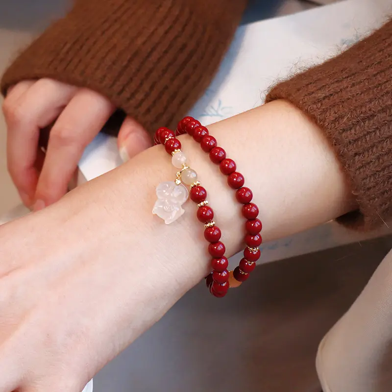 Handcrafted Strawberry Quartz Bear Red String Bracelet | Self-Love & 2026 Protection 1 - Buddha Bodhis Wearing Red String Cinnabar Bracelet for 2026 Luck