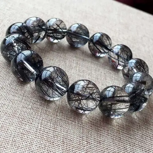 Black Rutilated Quartz: A Guide to Its Meaning, Healing Properties, and Uses 1 - Buddha Bodhis Black Rutilated Quartz A Guide to Its Meaning, Healing Properties, and Uses