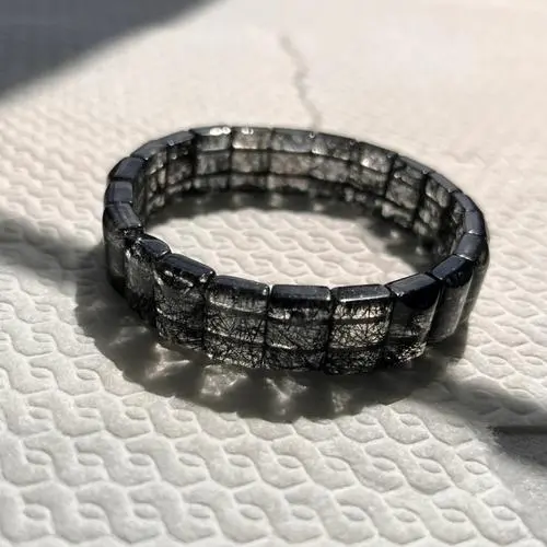 Black Rutilated Quartz: A Guide to Its Meaning, Healing Properties, and Uses 2 - Buddha Bodhis Black Rutilated Quartz A Guide to Its Meaning, Healing Properties, and Uses