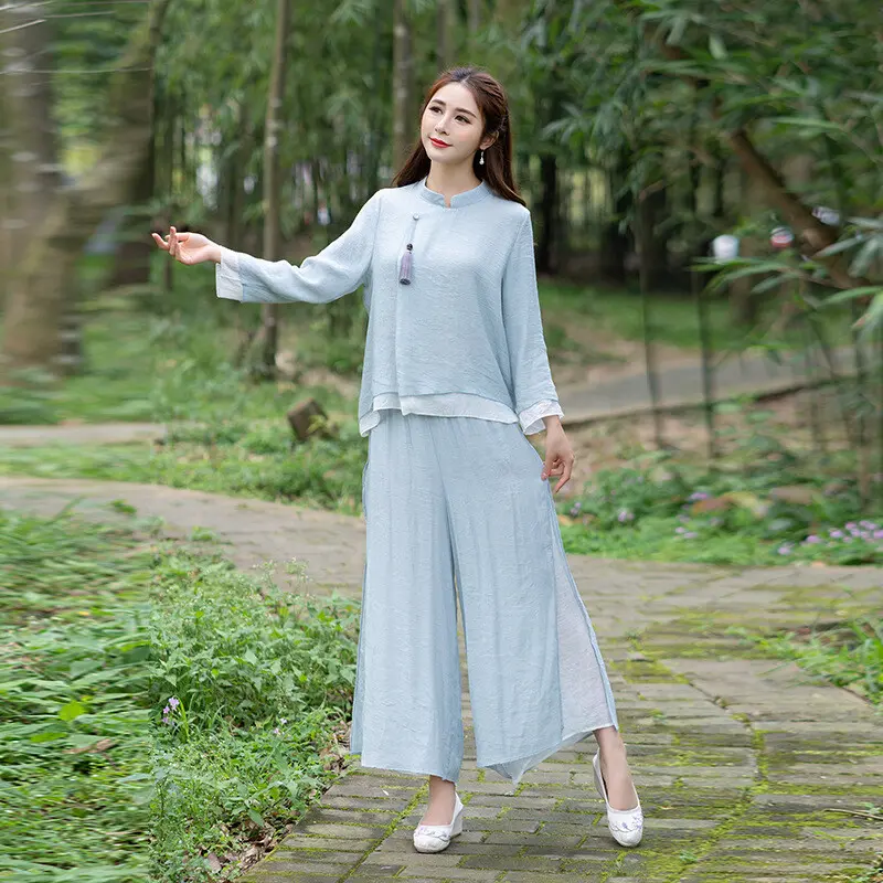 1 - Buddha Bodhis Close up of handmade frog buttons on women's linen shirt