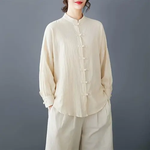 1 - Buddha Bodhis Detail of frog buttons on women's linen tang suit