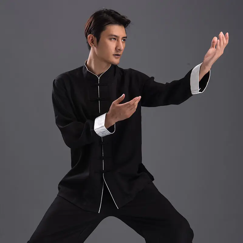 - Buddha Bodhis Man practicing Tai Chi in white linen qigong uniform