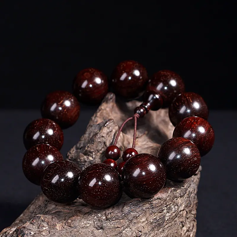 Tibetan Dzi Bead Mala | Ebony Wood Tassel Bracelet - Buddha Bodhis Monk using sandalwood wooden mala beads for meditation