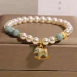 Natural Blue Aura Jadeite & Shell Pearl Rocking Horse Bracelet | Calm & 2026 Luck - Buddha Bodhis Natural Blue Aura Jadeite & Shell Pearl Rocking Horse Bracelet Calm & 2026 Luck