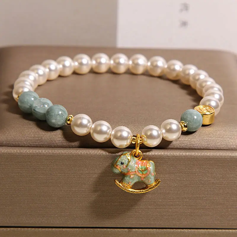Natural Blue Aura Jadeite & Shell Pearl Rocking Horse Bracelet Calm & 2026 Luck (3) Natural Blue Aura Jadeite & Shell Pearl Rocking Horse Bracelet Calm & 2026 Luck