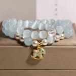 Natural Blue Cat's Eye & Pearl Double-Wrap Bracelet | Lucky Horse Charm - Buddha Bodhis Natural Blue Cat's Eye & Pearl Double-Wrap Bracelet | Lucky Horse Charm