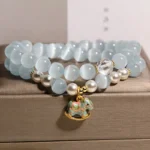 Natural Blue Cat's Eye & Pearl Double-Wrap Bracelet | Lucky Horse Charm 1 - Buddha Bodhis Natural Blue Cat's Eye & Pearl Double-Wrap Bracelet | Lucky Horse Charm