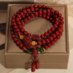 Natural Red Cinnabar Mala Bracelet | Lucky Peanut Charm for Abundance & Growth 1 - Buddha Bodhis Natural Red Cinnabar Mala Bracelet Lucky Peanut Charm for Abundance & Growth