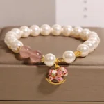 Natural Strawberry Quartz & Shell Pearl Rocking Horse Bracelet | Grace & Joy - Buddha Bodhis Natural Strawberry Quartz & Shell Pearl Rocking Horse Bracelet Grace & Joy