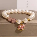 Natural Strawberry Quartz & Shell Pearl Rocking Horse Bracelet | Grace & Joy 1 - Buddha Bodhis Natural Strawberry Quartz & Shell Pearl Rocking Horse Bracelet Grace & Joy
