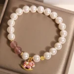 Natural Strawberry Quartz & Shell Pearl Rocking Horse Bracelet | Grace & Joy 4 - Buddha Bodhis Natural Strawberry Quartz & Shell Pearl Rocking Horse Bracelet Grace & Joy