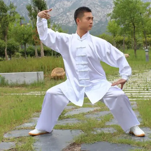 - Buddha Bodhis Practicing Tai Chi in loose linen uniform for energy flow