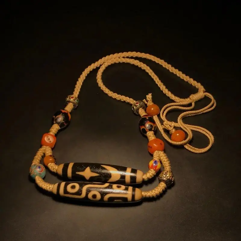 - Buddha Bodhis Rare antique Tibetan Dzi bead with weathering marks