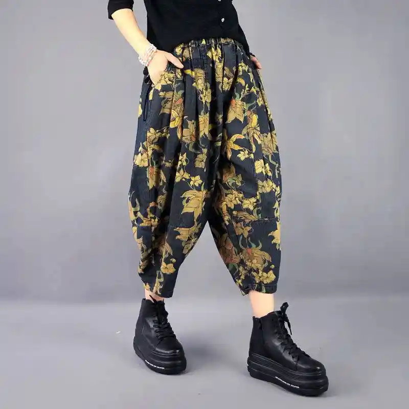 - Buddha Bodhis Woman wearing patterned boho harem pants at festival