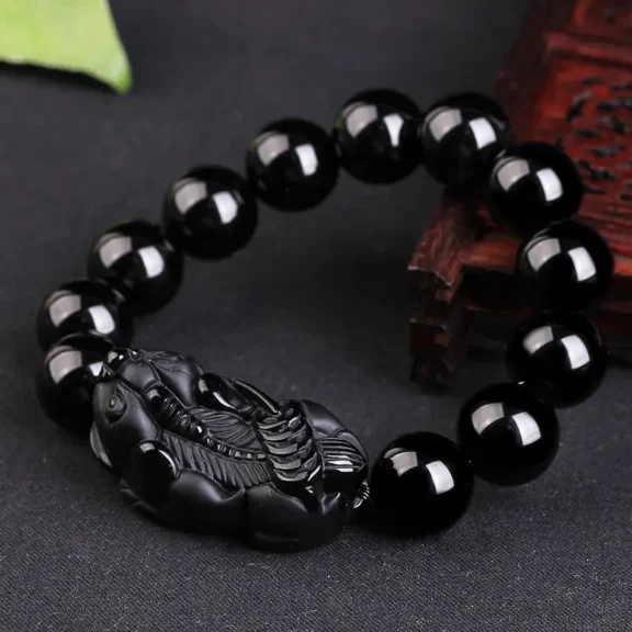 Choosing Your Protective Stone for 2026: Black Obsidian vs. Black Tourmaline - Buddha Bodhis Choosing Your Protective Stone for 2026 Black Obsidian vs. Black Tourmaline