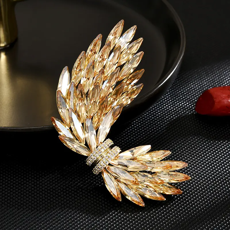 Golden Wing Austrian Crystal Brooch Phoenix Rising Talisman for Heart Protection (1) Golden Wing Austrian Crystal Brooch | Phoenix Rising Talisman for Heart Protection