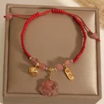 Handcrafted Strawberry Quartz Cat Paw Red String Bracelet | 2026 Protection & Luck Bell - Buddha Bodhis Handcrafted Strawberry Quartz Cat Paw Red String Bracelet 2026 Protection & Luck Bell