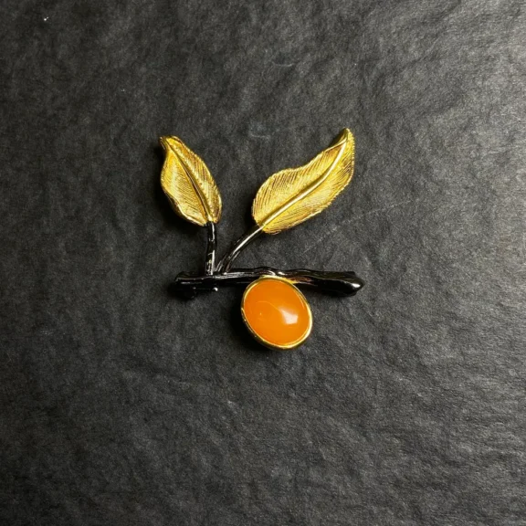 The Deeper Meaning of Wearing a Brooch: Symbolism, Protection, and the Heart Chakra 3 - Buddha Bodhis The Deeper Meaning of Wearing a Brooch Symbolism, Protection, and the Heart Chakra