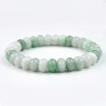 Natural Grade A Jadeite Pumpkin Bead Bracelet – Protection, Tranquility & Spiritual Vitality - Buddha Bodhis natural-green-jadeite-beaded-bracelet