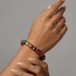 Five-Way Wealth God Pixiu Cinnabar Bracelet for Abundance & Spiritual Protection 1 - Buddha Bodhis cinnabar-pixiu-wealth-bracelet-luxury-model-wrist