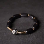 Dzi Bead Ebony Wood Bracelet