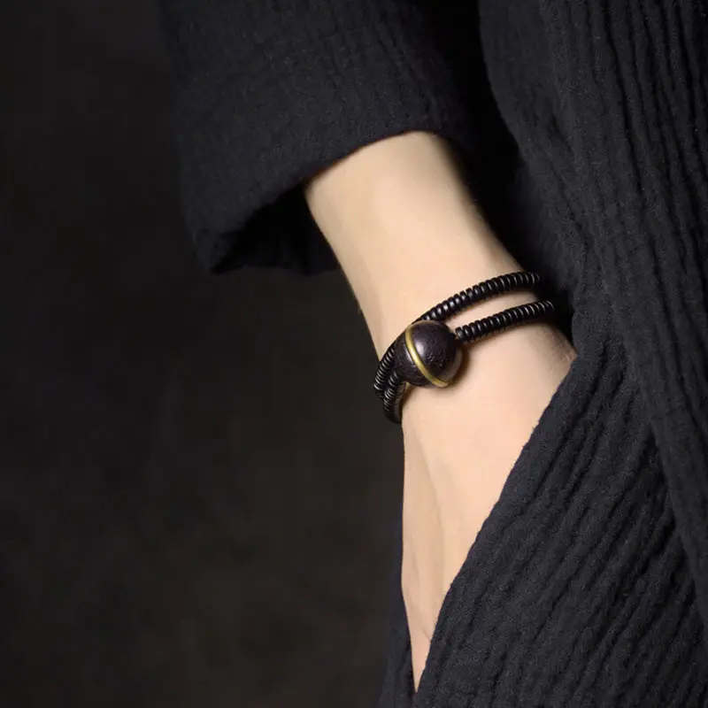 The Center of All Things A Minimalist Ebony Bracelet