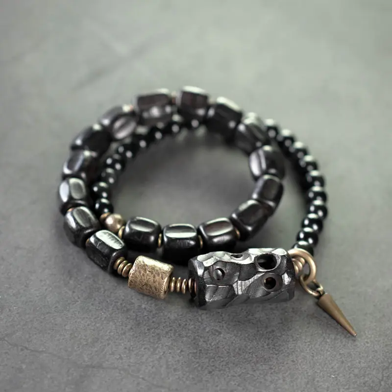 The Guardian's Path A Carved Ebony And Onyx Bracelet